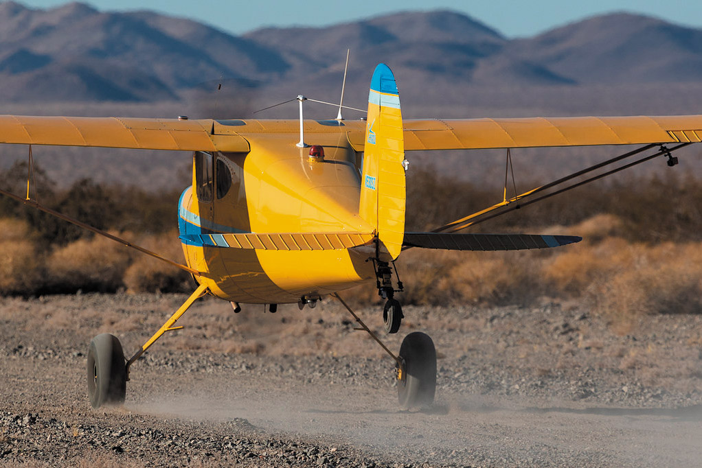 Cessna 120 on a dirt strip