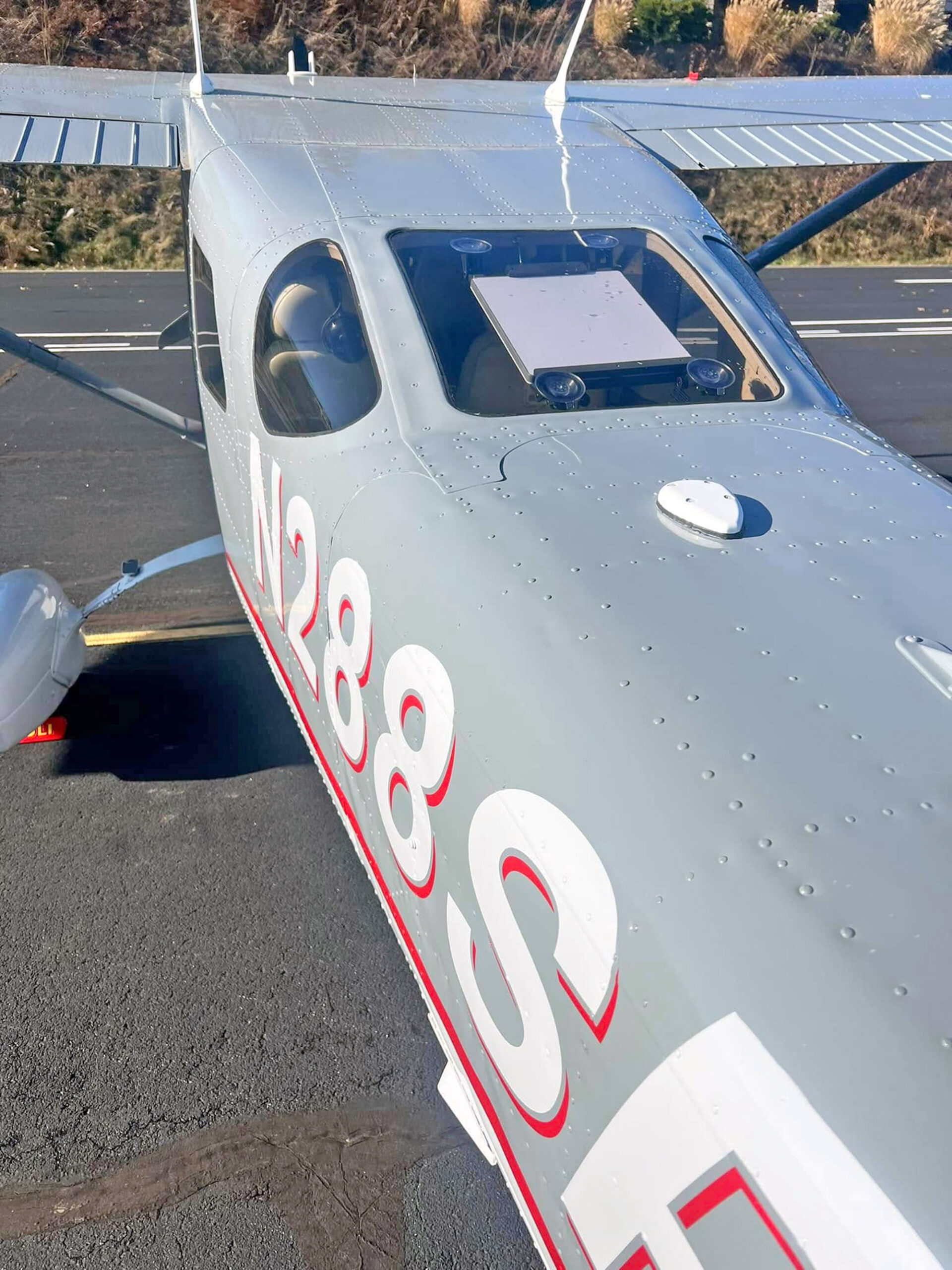 Starlink suctioned to the rear window of a Cessna 206