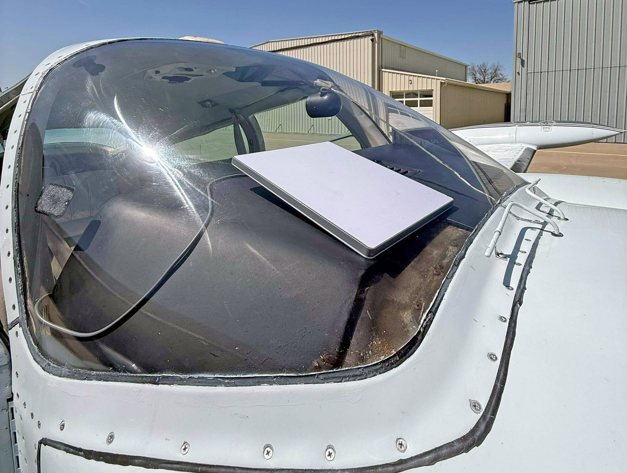 Starlink antenna in the windshield of a Cessna 310
